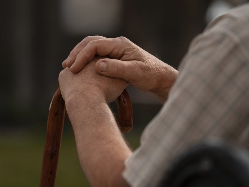 side-view-old-man-sitting-bench.jpg