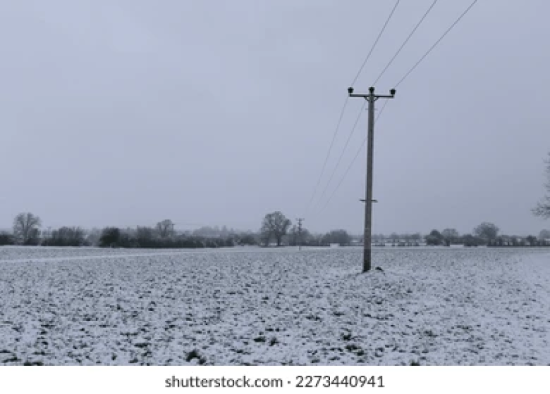 power-lines-over-farm-field-260nw-2273440941.png
