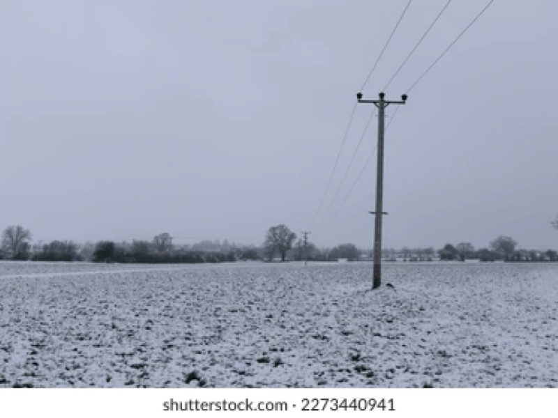 power-lines-over-farm-field-260nw-2273440941.png
